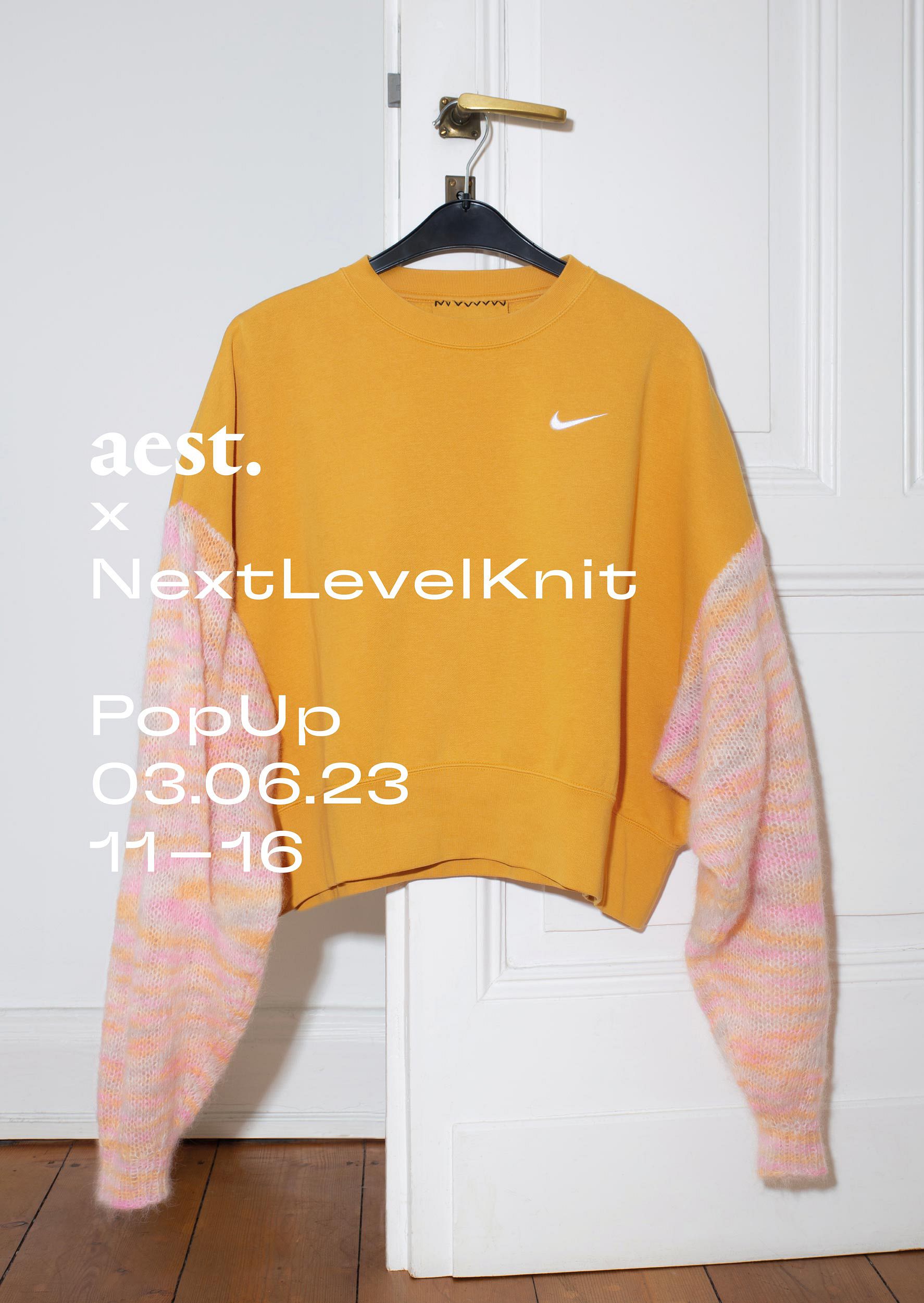 Poster announcing the pop-up show at aest store, featuring an orange upcycled jumper from Next Level Knit with hand-knitted woollen sleeves.